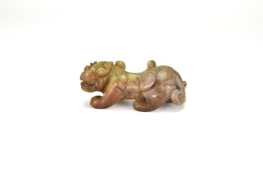 A Carved Jade Tiger (Bixie). Han Dynasty Style.