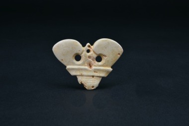 Late Neolithic Period. A Jade (or Stone) Anthropomorphic Mask Pendant.