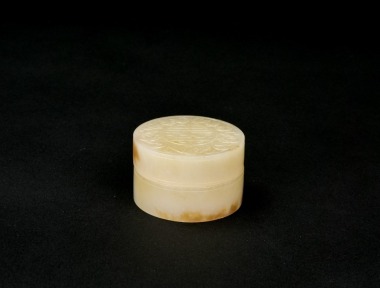 Qing Dynasty. A White Jade &lsquo;Wufu Pengshou&rsquo; Circular Covered Box.