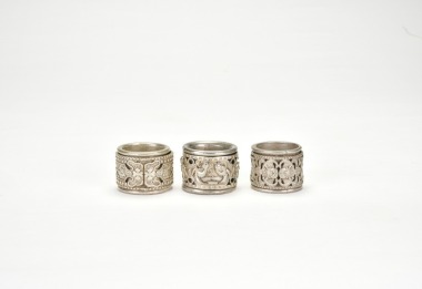 China, Qing Guangxu Period and Mark. A Group of Three Chinese Silver Openwork Wide-Band Rings.