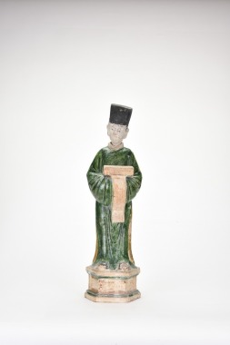 Tang Dynasty (AD 618&ndash;907). A Green-Glazed Pottery Figure of a Civil Official.