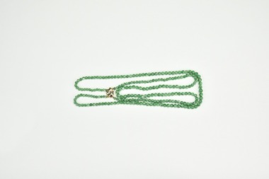 A Green Jade Beads Necklace with 14K Two-Tone Gold Clasp.