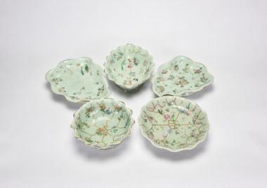 A Group of Five Famille-Rose Dishes on Pale Celadon-Green Ground