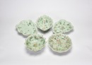 A Group of Five Famille-Rose Dishes on Pale Celadon-Green Ground