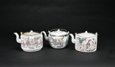 A Group of Three Famille-Rose Teapots with Figural Decoration