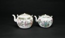 A Pair of Famille-Rose Teapots with Figural and Floral Decoration