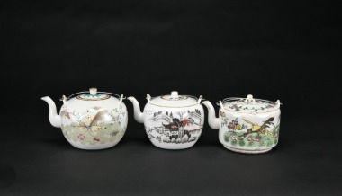 A Group of Three Famille-Rose Teapots with Landscape and Bird-and-Flower Designs, Tongzhi Marks