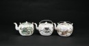 A Group of Three Famille-Rose Porcelain Teapots, Tongzhi Period