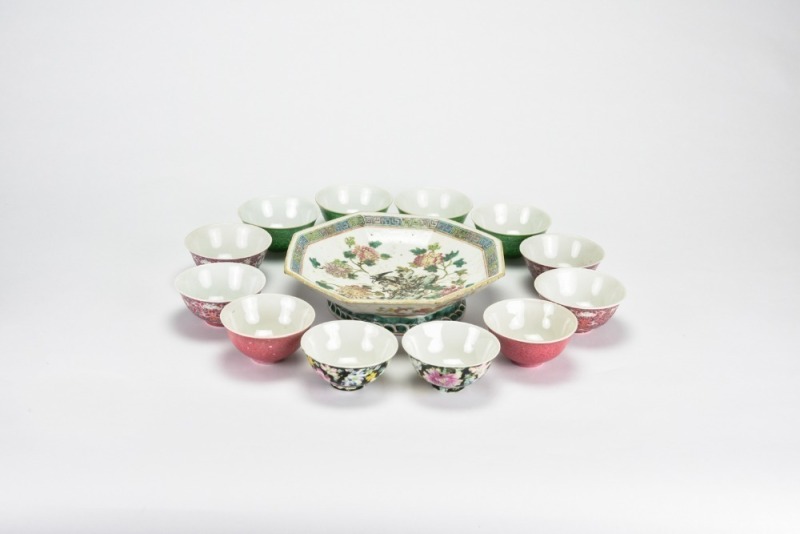 A Group of Twelve Famille-Rose Teacups with One Dish on Pale Green Ground