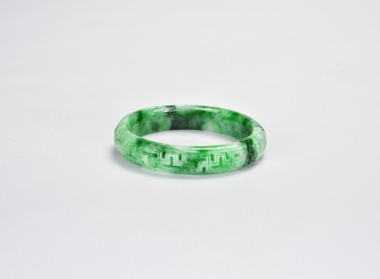 A Carved Jadeite &lsquo;Key-Fret&rsquo; Bangle