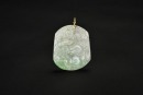 One Carved Semi-Translucent Jadeite &lsquo;Qilin&rsquo; Pendant With 14K Gold Mount