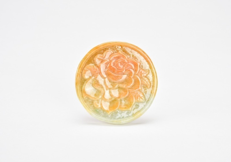 A Yellow Jadeite Carved &lsquo;Peony&rsquo; Pendant