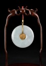 A Jadeite and 14K Gold Dragon and Phoenix Pendant - 7