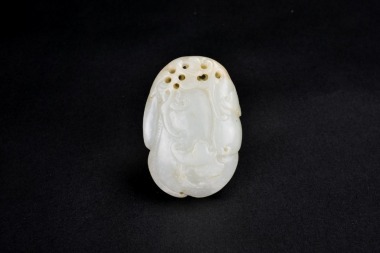 A White Jade Pendant Carved as Melon with Vines, Qing Dynasty