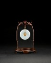A Jadeite and 14K Gold Dragon and Phoenix Pendant