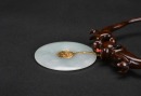A Jadeite and 14K Gold Dragon and Phoenix Pendant - 3