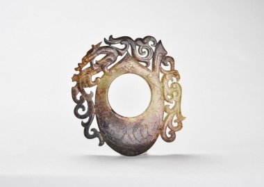 A Jade &lsquo;Dragon and Phoenix&rsquo; Openwork Pendant, Han