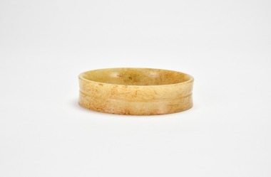 A Jade &lsquo;Xuanwen&rsquo; Bracelet, Warring States Period