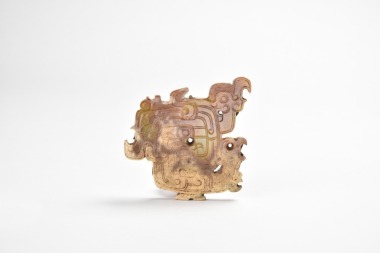 A Chinese Archaic Jade Dragon-Form Plaque, Zhou Dynasty