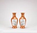 A Pair of Iron-Red Ground Gilt-Decorated Famille Rose Floral Vases