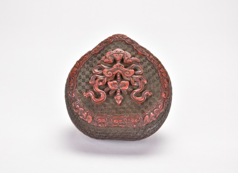 A Carved Polychrome Cinnabar and Black Lacquer Heart-Shaped Covered Box. Qing Dynasty