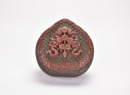 A Carved Polychrome Cinnabar and Black Lacquer Heart-Shaped Covered Box. Qing Dynasty