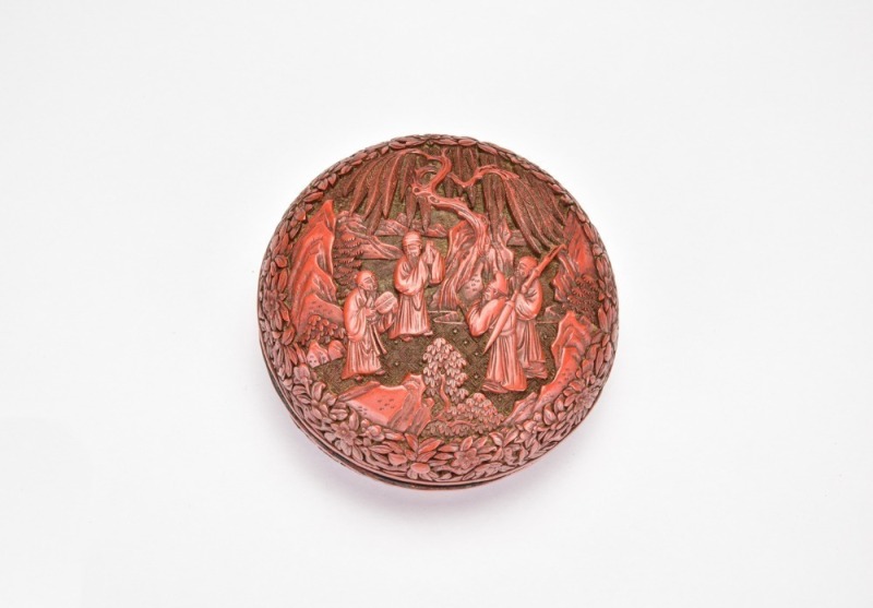 A Carved Cinnabar Lacquer Circular Covered Box with a Gathering of Scholars. Qing Dynasty