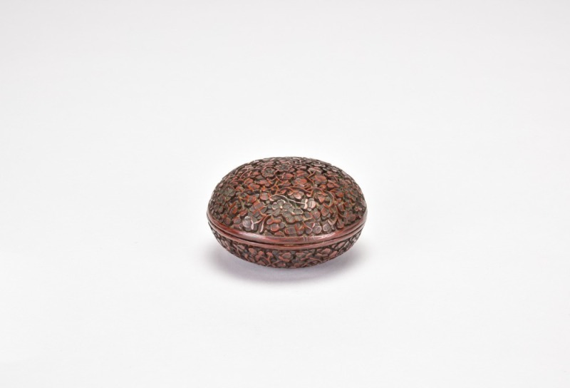 A Carved Cinnabar Lacquer Circular Covered Box with Plum Blossom Decoration. Late Qing Dynasty to Republic Period