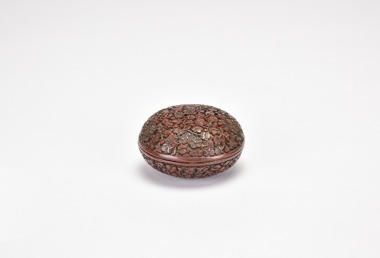 A Carved Cinnabar Lacquer Circular Covered Box with Plum Blossom Decoration. Late Qing Dynasty to Republic Period
