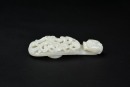 A White Jade Openwork Dragon Belt Hook. Qianlong&ndash;Jiaqing Period - 2