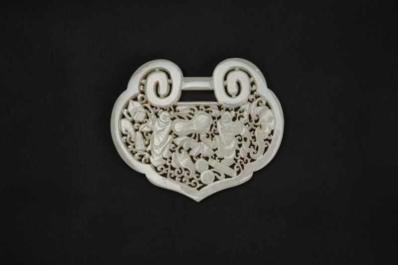 A White Jade Openwork Plaque Depicting the Hehe Erxian and the Hidden Eight Immortals&rsquo; Attributes