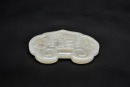 A White Jade Openwork Plaque Depicting the Hehe Erxian and the Hidden Eight Immortals&rsquo; Attributes - 8