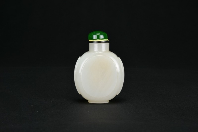 A White Jade Snuff Bottle. Qing Dynasty