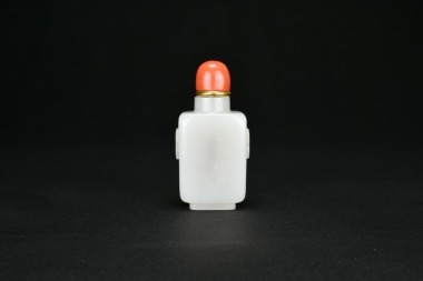 A White Jade &lsquo;Lion Mask&rsquo; Snuff Bottle. Qing Dynasty
