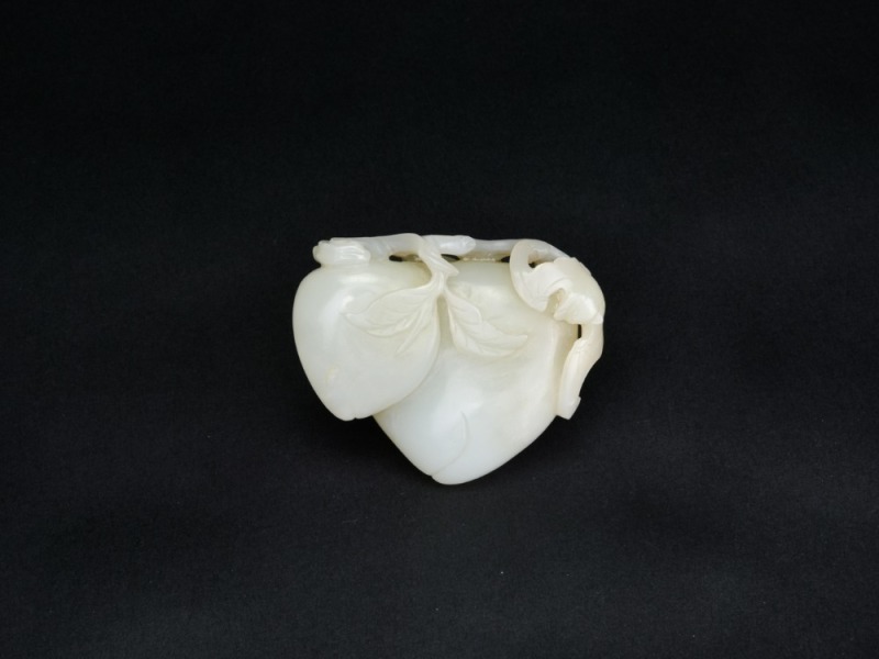 A White Jade Double Peach Group with a Bat. Qianlong Period