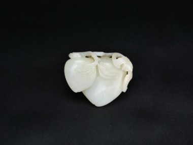 A White Jade Double Peach Group with a Bat. Qianlong Period
