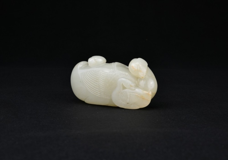A White Jade Carving of a Mandarin Duck with Two Ducklings. Qianlong Period
