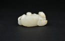A White Jade Carving of a Mandarin Duck with Two Ducklings. Qianlong Period - 2