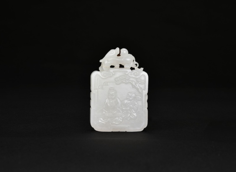 A White Jade Carved &lsquo;Scholar Playing the Qin&rsquo; Zigang Plaque