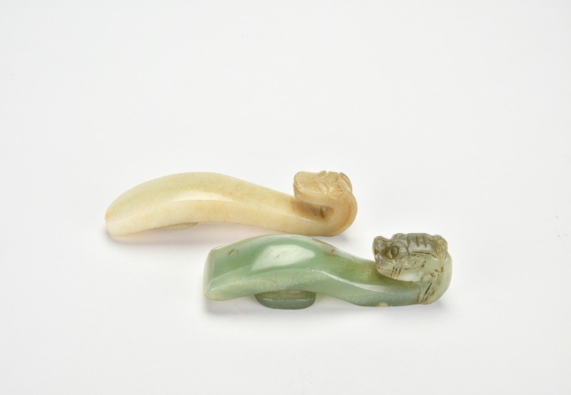 A Group of Two Carved Jade Zoomorphic Belt Hook
