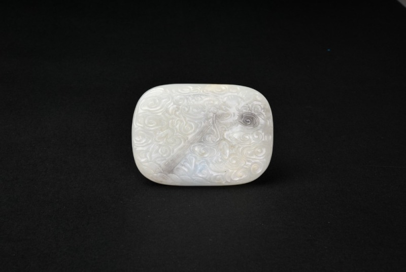 A White Jade &lsquo;Qin and Auspicious Clouds&rsquo; Belt Buckle