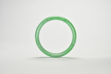 A Green Jadeite Bangle