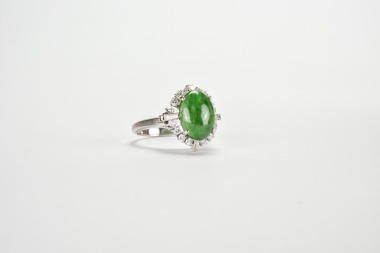 A Jadeite Cabochon and Diamond Ring