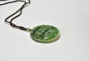 A Jadeite Circular Pendant Carved with Mandarin Ducks - 4