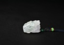 A Carved Translucent Jadeite Dragon Pendant