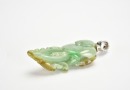 A Carved Jadeite Dragon Pendant with Russet and Emerald Inclusions - 9