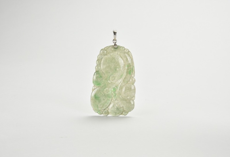 An Icy Jadeite Pendant Carved with Lingzhi and Ruyi Motifs
