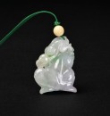 A Carved Jadeite &lsquo;Monkey and Lingzhi&rsquo; Pendant - 2