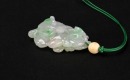 A Carved Jadeite &lsquo;Monkey and Lingzhi&rsquo; Pendant - 6