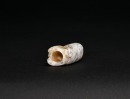 A Mottled Jade Animal-Form Tubular Pendant, Shang Dynasty - 8